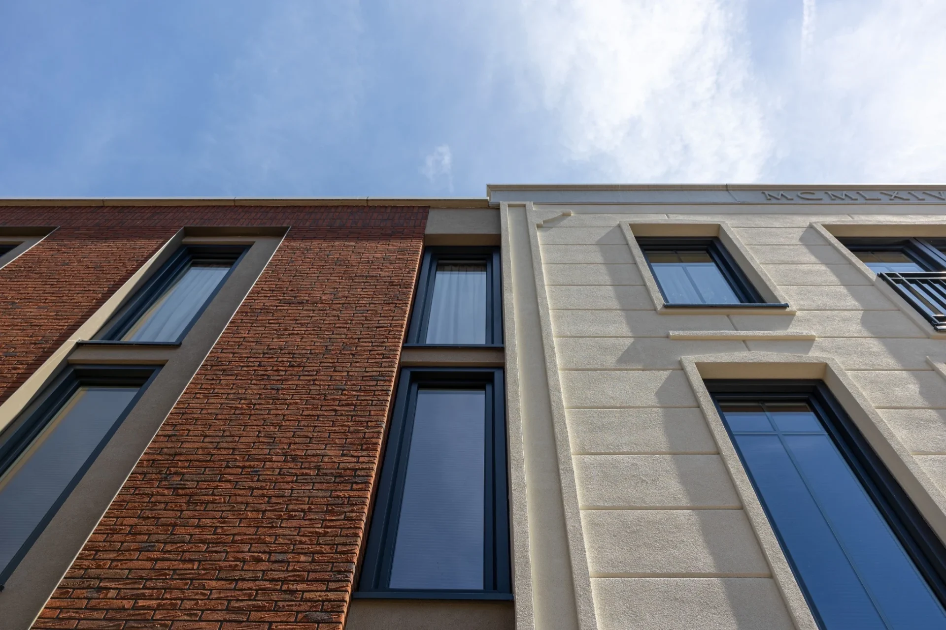 Gevels bij gemoderniseerd pand in Oldenzaal, door LEF Architecten